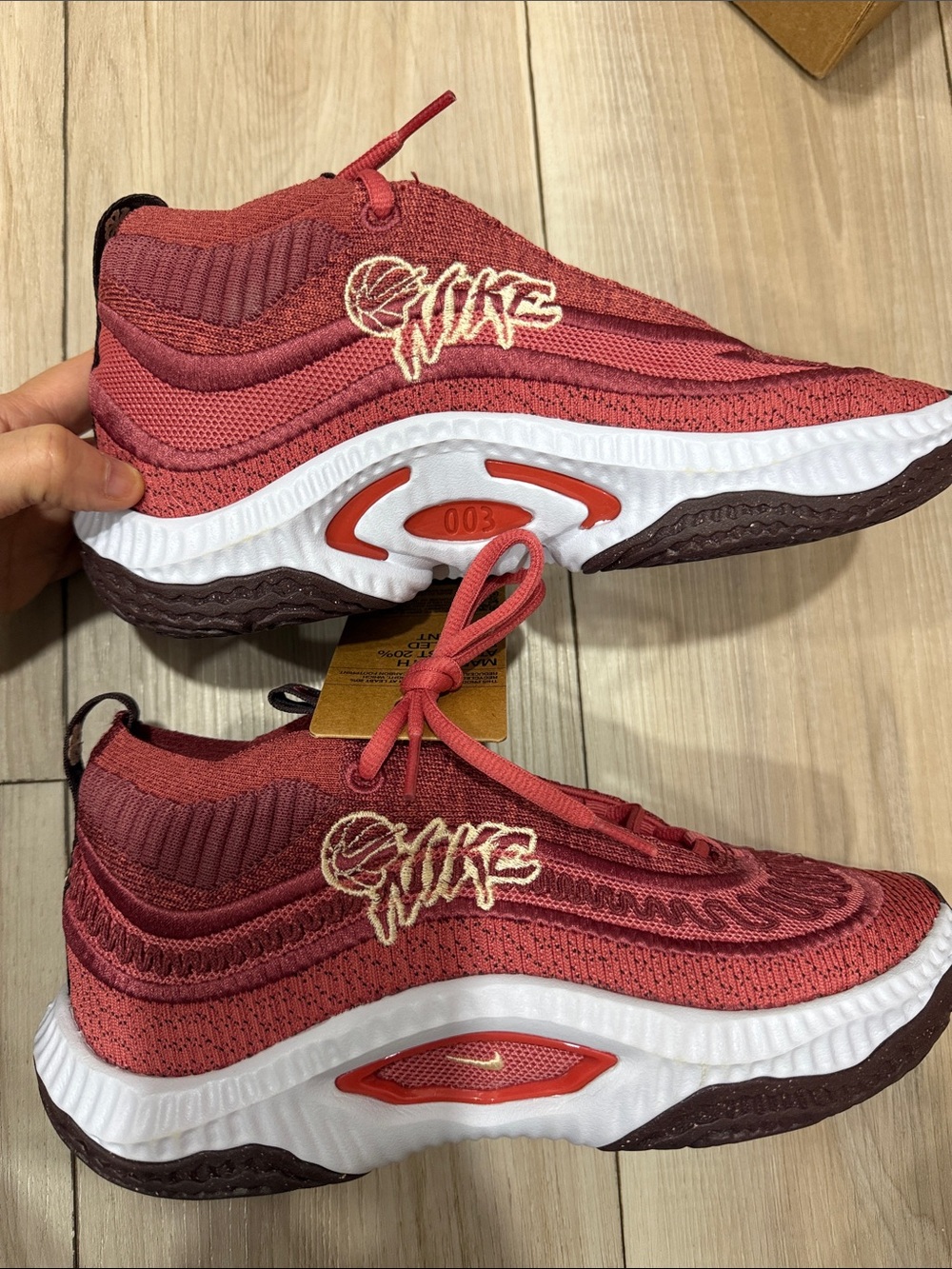 Nike Red Knit Trainers with White Midsole and Brown Outsole
